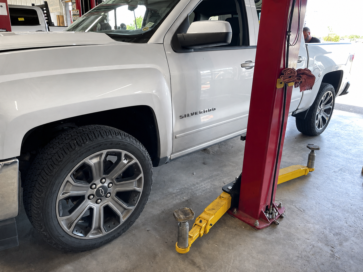 Silverado before lift kit, on the alignment rack